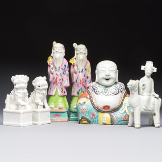 Two Chinese Dehua blanc-de-Chine Buddhist lions, three famille rose figures, and a white-glazed group, Kangxi and later