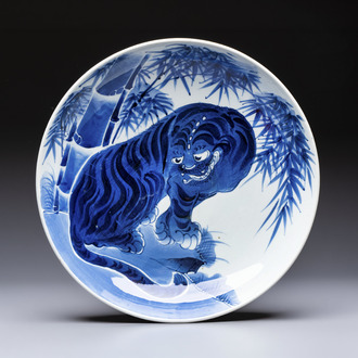 A large Japanese Arita blue and white 'Tiger' dish, Fuuki Chousun 富貴長春 mark, late Edo to early Meiji, 18/19th C.