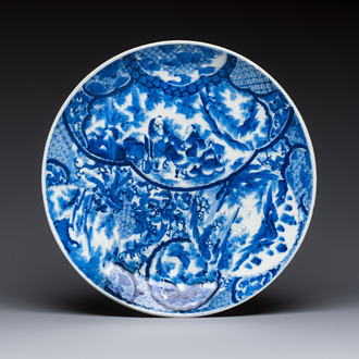 A Japanese blue and white dish with narrative design, Meiji, 19th C.