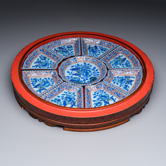 A Chinese enamelled Yixing stoneware nine-piece 'peonies' sweetmeat set on a Southeast Asian lacquer tray, 19th C.