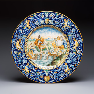 A massive polychrome Italian maiolica istoriato charger with a classical battle scene, 19th C.