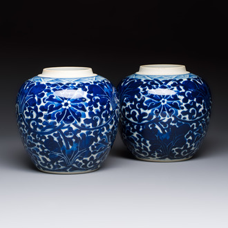 A pair of Chinese blue and white 'Lotus Scroll' jars, 19th C.