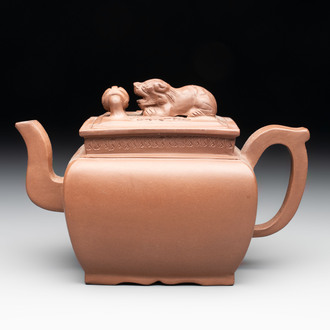 A Chinese Yixing stoneware 'lion and brocade ball' teapot and cover, 19/20th C.