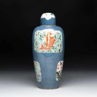 A Chinese famille verte powder-blue-ground 'Fish and Bird' vase and cover, 19th C.