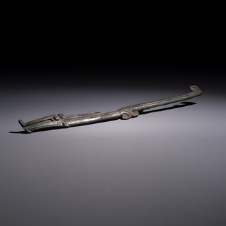 A large Chinese archaic bronze dragon-shaped fitting, early Western Zhou