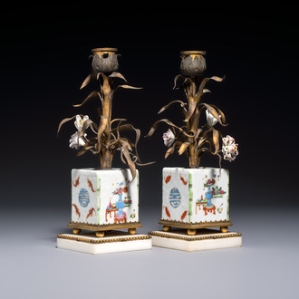 A pair of gilt silver and metal candlesticks with Chinese porcelain, European porcelain flowers, and marble bases, marked Boin-Taburet, late 19th C.