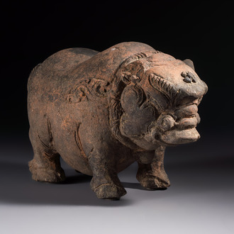 A Javanese terracotta boar-shaped money bank, probably Majapahit Kingdom, 15th C.