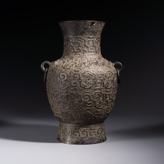 A Chinese archaistic bronze vase with Taotie handles, 'Hu 壺', Ming