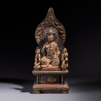 A Chinese gilt-lacquered wooden Bodhisattva and attendants on a throne, Qing