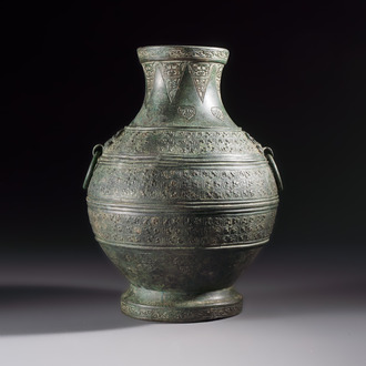 An extremely rare Chinese archaic bronze wine vessel, 'Hu 壺', Warring States period