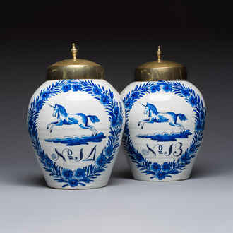 A pair of blue and white Dutch Delft 'Leaping Unicorn' tobacco jars, 18th C.