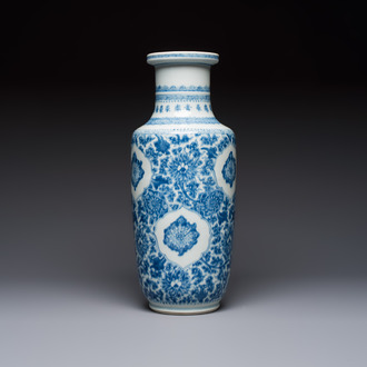 A Chinese blue and white rouleau vase with floral design, Kangxi