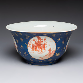 A large Chinese iron-red and gilt-decorated powder-blue-ground bowl with narrative design, 19th C.