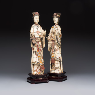 A pair of Chinese polychromed carved bone figures of divinities, 20th C.