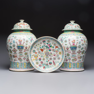 A pair of Chinese famille rose 'Antiquities' covered vases and a dish, 19th C.