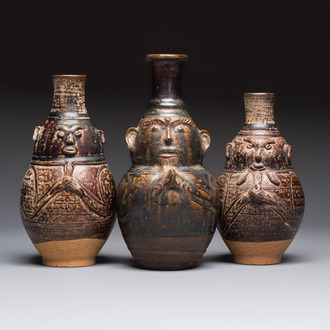 Three khmer-style brown-glazed anthropomorphic gourd-form bottles, probably 12/13th C.
