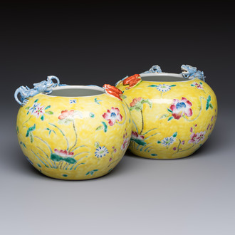 A pair of Chinese famille rose yellow-ground water pots with floral design and applied chilong and bats, Qianlong mark, 19/20th C.