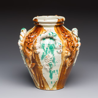 A polychrome Saintonge pottery vase with rope twist handles and mascarons, France, 17th C.