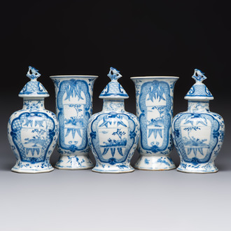 A rare Chinese blue and white five-piece garniture in Dutch Delft style, Kangxi mark, 19th C.