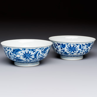 A pair of Chinese blue and white 'lotus scroll' bowls, Yongzheng mark and of the period