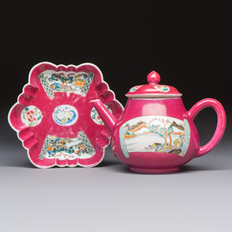 A Chinese famille rose ruby-ground 'Landscape Scroll' teapot and stand, Yongzheng