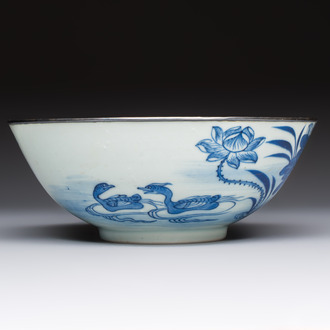 A Chinese blue and white 'Bleu de Hue' bowl with mandarin ducks in a lotus pond and a poem, Ngoan Ngoc 玩玉 mark, 19th C.