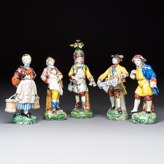 Five polychrome Delftware models of figures from everyday life, probably Desvres, France, 19th C.
