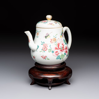 A Chinese famille rose 'Birds and Insects among Flowers' teapot on a later wooden stand, Yongzheng