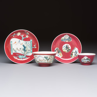 Two Chinese famille rose ruby-ground 'Landscape Scroll' cups and saucers, Yongzheng