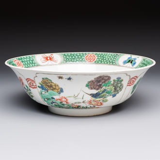 A Chinese famille verte bowl with bird and butterflies among flowers, lozenge mark, Kangxi