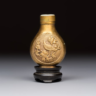A Chinese gilt-bronze and mother-of-pearl-inlaid snuff bottle with birds among flowering branches, Guangxu mark and of the period