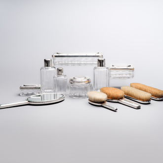 An Art Deco 12-piece silver toiletry set, Wolfers Frères, Brussels, 20th C.