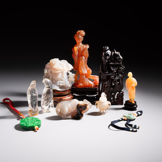 A group of ten Chinese hardstone and cherry amber carvings, 20th C.