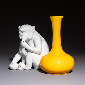 A Japanese Awaji yellow-glazed vase and a white-glazed 'Monkey' group, 19/20th C.
