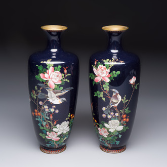 A pair of Japanese silver-wired cloisonné enamel vases with birds among flowering branches, Meiji period, 19th C.