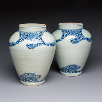 A pair of unusual Japanese Arita blue and white 'Unfinished' vases, Edo, 17/18th C.