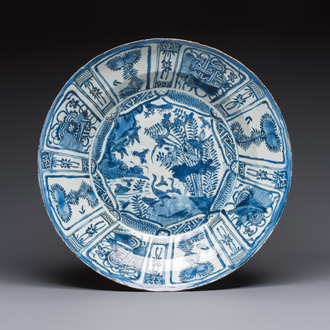 A very large Chinese blue and white 'Kraak' dish with geese by the water, Wanli