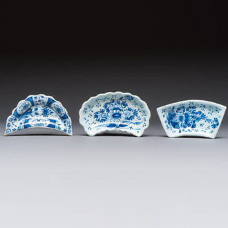 Two blue and white English Delftware condiment plates and a German Nürnberg example, 18th C.