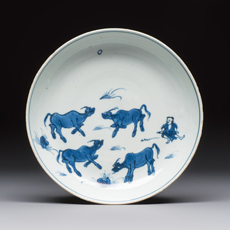 A Chinese blue and white ko-sometsuke 'Buffalo Herder' plate for the Japanese market, Tianqi