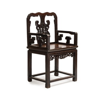 A Chinese carved hongmu armchair, 19th C.