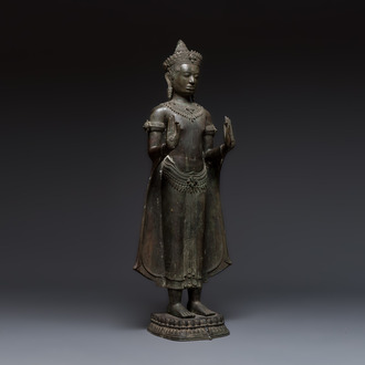 A large bronze Lopburi-style standing Buddha Shakyamuni, Thailand or Cambodia, 20th C.