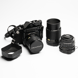 A Pentax 6x7 MLU with TTL prism, 3 lenses and accessories