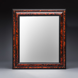 A large rectangular tortoiseshell-veneered and ebonised wood frame with later mirror, probably Flanders, 19th C.