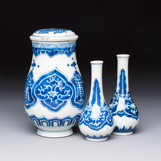 A Chinese blue and white covered vase and two bottle vases, Chenghua and jade marks, Kangxi