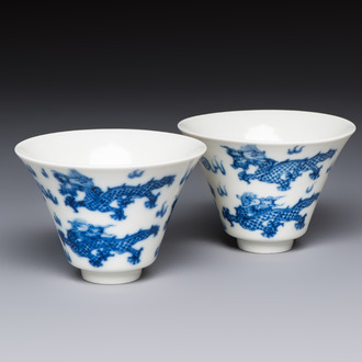 A pair of Chinese blue and white 'Bleu de Hue' 'Dragon' cups, Nhuoc Tham Tran Tang 若深珍藏 mark, 19th C.