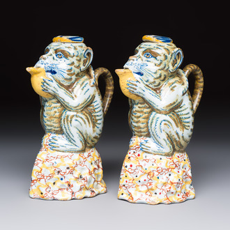 A pair of polychrome Dutch Delft monkey ewers and covers, 18th C.