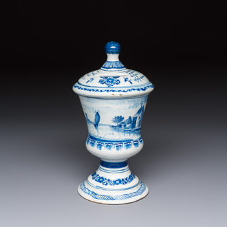 A blue and white inscribed Dutch Delft children's money bank, dated 1786