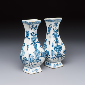 A pair of Chinese blue and white 'Antiquities' wall pocket vases, Kangxi