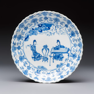 A Chinese blue and white 'Elegant Ladies Making Music' plate, Chenghua mark, Kangxi