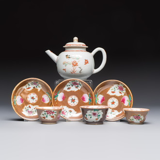 A Chinese famille verte teapot and three famille rose capucine-ground cups and saucers, Kangxi/Qianlong